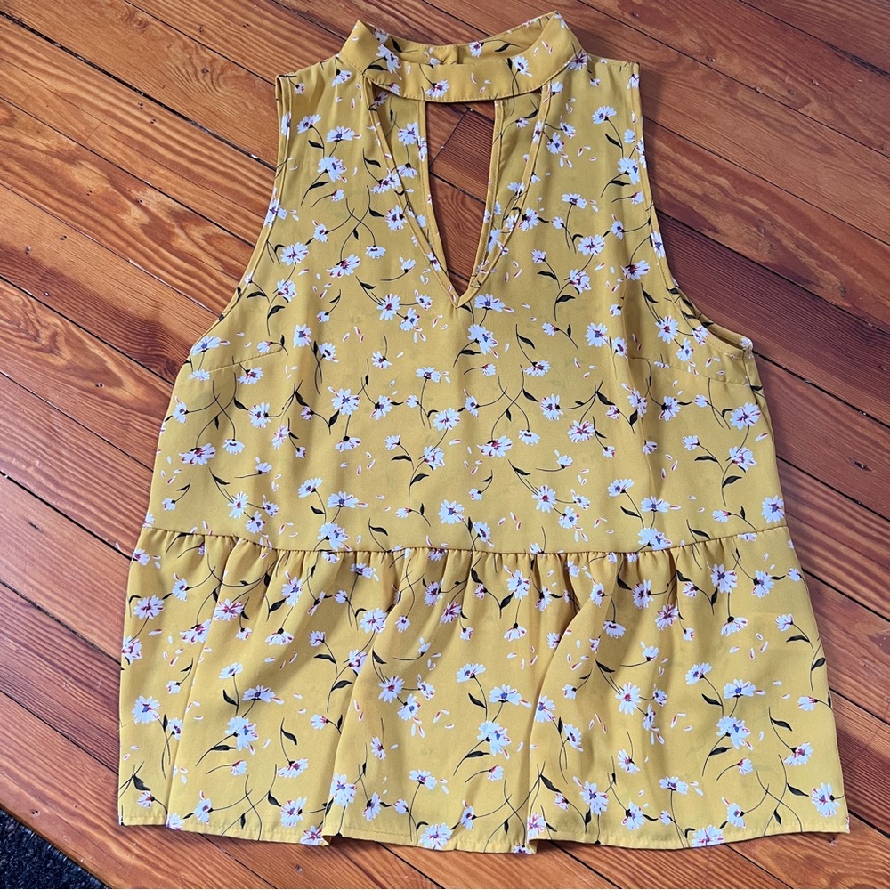 Yellow floral tank top with cut outs size medium Francescas